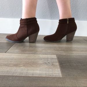 Brown heeled booties with braided design!